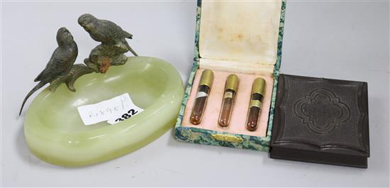 A cold painted bronze budgie ashtray, a daguerreotype and WWI perfumes